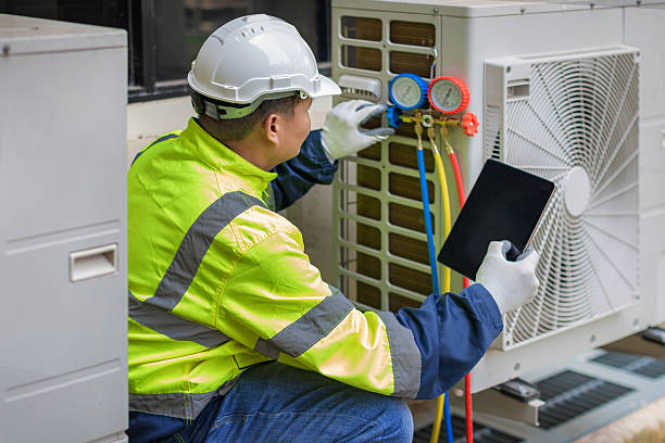 Professional Air Conditioning Repair technician working in Wallingford, IA
